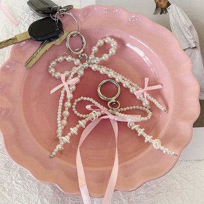 2026 New Korean Fashion Sweet Pearl Bow Keychain, Pearl Bow Keychain – Elegant Coquette Bag Charm with Pink Ribbon