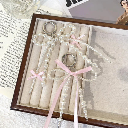 2026 New Korean Fashion Sweet Pearl Bow Keychain, Pearl Bow Keychain – Elegant Coquette Bag Charm with Pink Ribbon