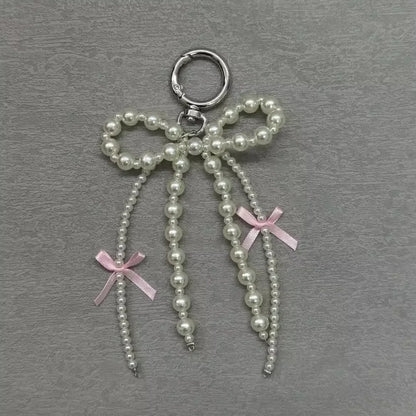 2026 New Korean Fashion Sweet Pearl Bow Keychain, Pearl Bow Keychain – Elegant Coquette Bag Charm with Pink Ribbon