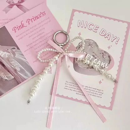 2026 New Korean Fashion Sweet Pearl Bow Keychain, Pearl Bow Keychain – Elegant Coquette Bag Charm with Pink Ribbon