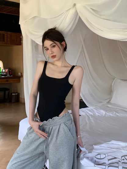 Sexy U-neck ribbed bodysuit with low cut, high waist & slim fit.Back straps & snap bottom. Perfect hot girl summer look!