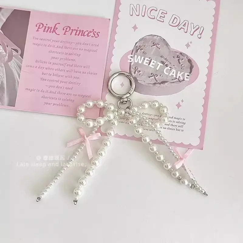 2026 New Korean Fashion Sweet Pearl Bow Keychain, Pearl Bow Keychain – Elegant Coquette Bag Charm with Pink Ribbon