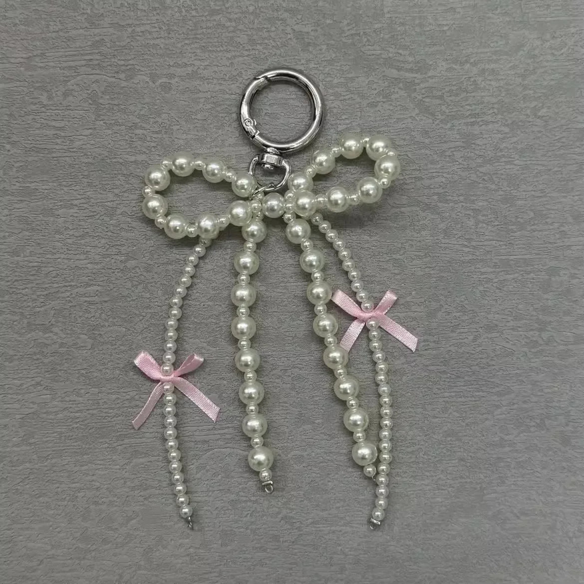 2026 New Korean Fashion Sweet Pearl Bow Keychain, Pearl Bow Keychain – Elegant Coquette Bag Charm with Pink Ribbon