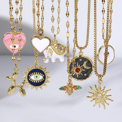Gold Charm Pendant Necklace Collection – Celestial Eye Heart Sun Moon Layered Necklaces for Women