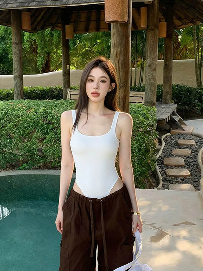 Sexy U-neck ribbed bodysuit with low cut, high waist & slim fit.Back straps & snap bottom. Perfect hot girl summer look!