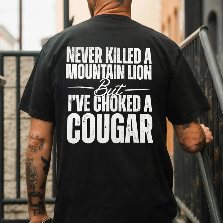 Men's printed T-shirt: "I've never killed a puma, but I have strangled one"