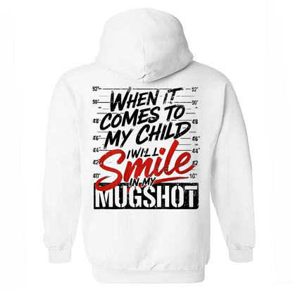 Protective Parent Hoodie – “I Will Smile In My Mugshot” Funny Graphic Hoodie